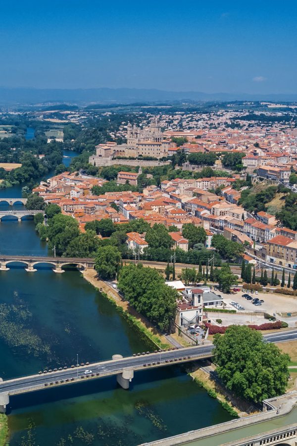 aerial-top-view-of-beziers-town-river-and-bridges-from-above-south-france